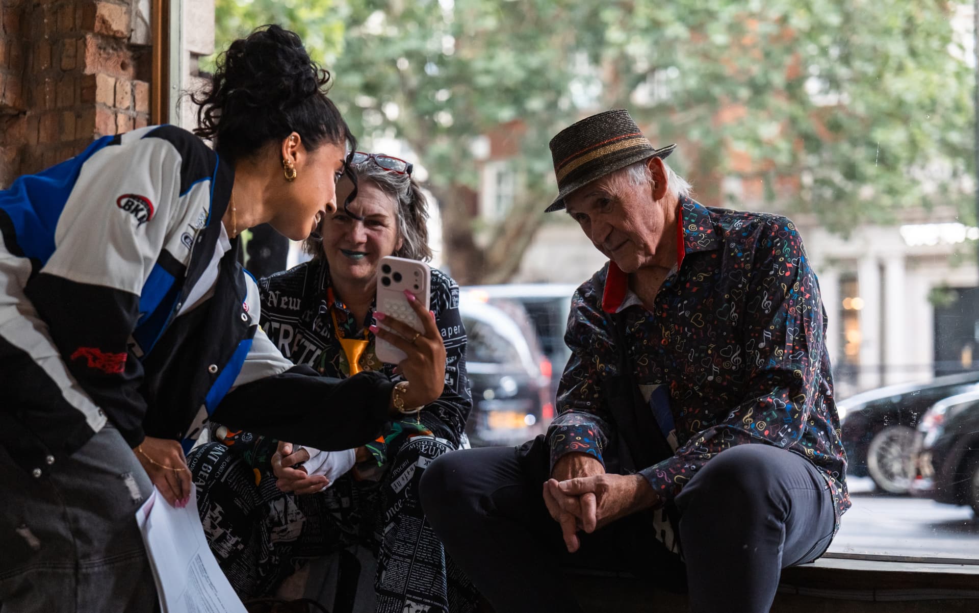 Guests together by a window at a ShadesOf event